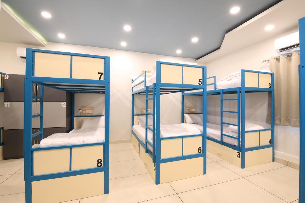 Postel nebo postele na pokoji v ubytování Blue Beds Hostel