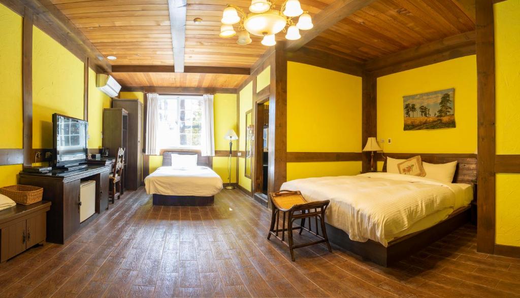Postel nebo postele na pokoji v ubytování Provence Rose Lodge
