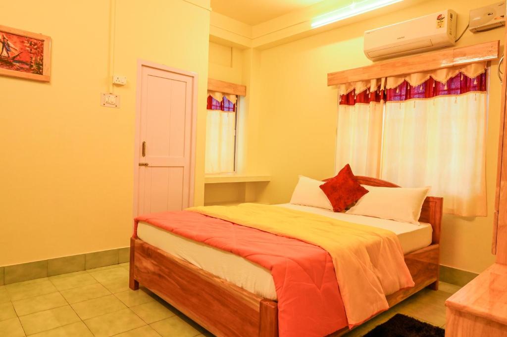 Kanchans Nest I Rooms & Suites near Port Blair Airport 객실 침대