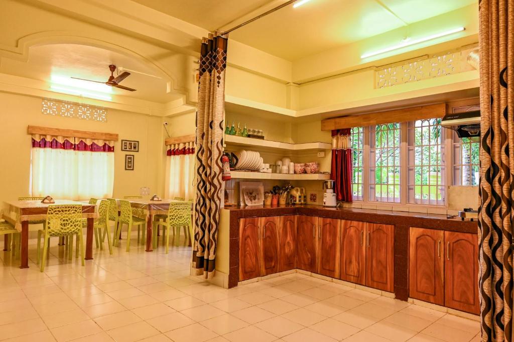 Kanchans Nest I Rooms & Suites near Port Blair Airport 레스토랑 또는 맛집