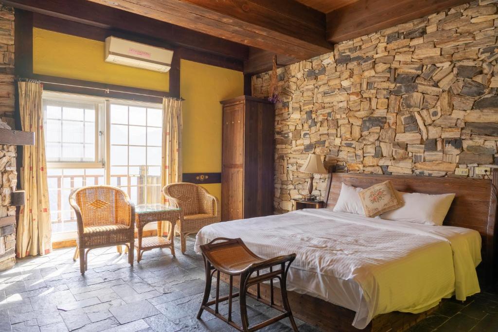 Postel nebo postele na pokoji v ubytování Provence Rose Lodge