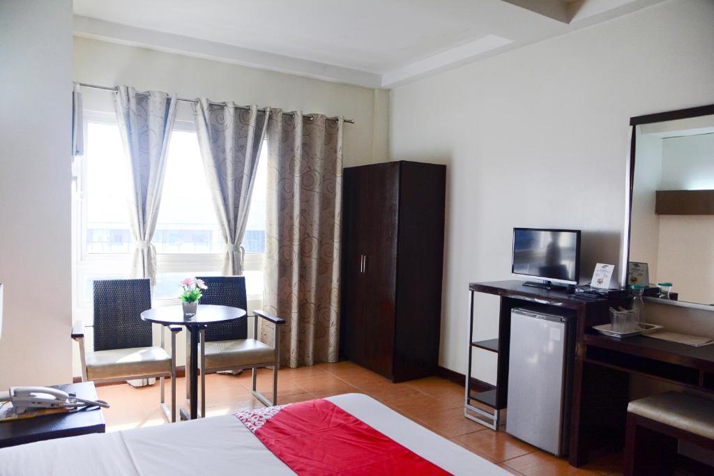TV a/nebo společenská místnost v ubytování East View Hotel