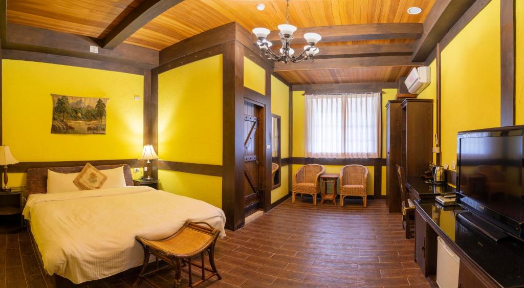 Postel nebo postele na pokoji v ubytování Provence Rose Lodge