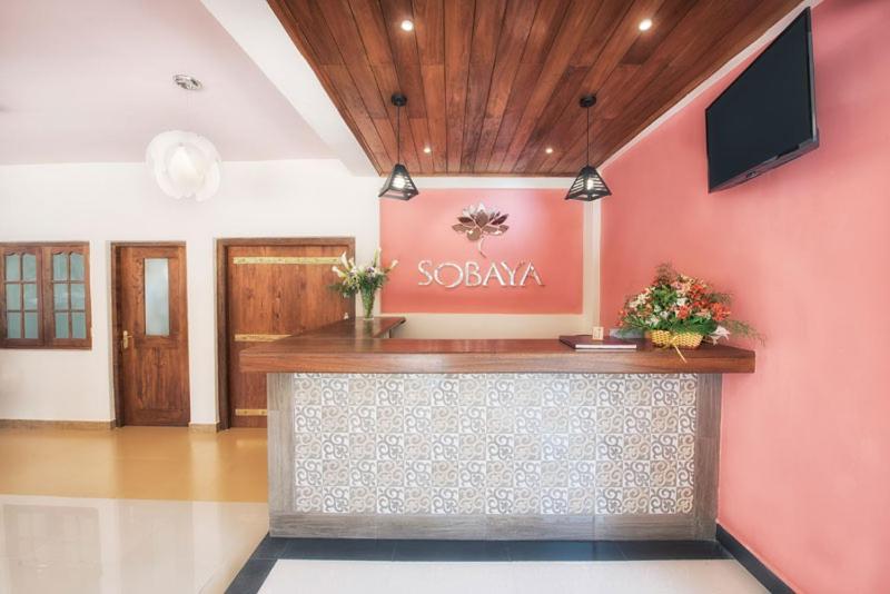 TV a/nebo společenská místnost v ubytování Sobaya Hotel