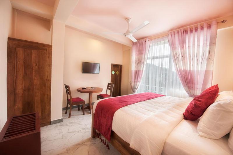 Postel nebo postele na pokoji v ubytování Sobaya Hotel