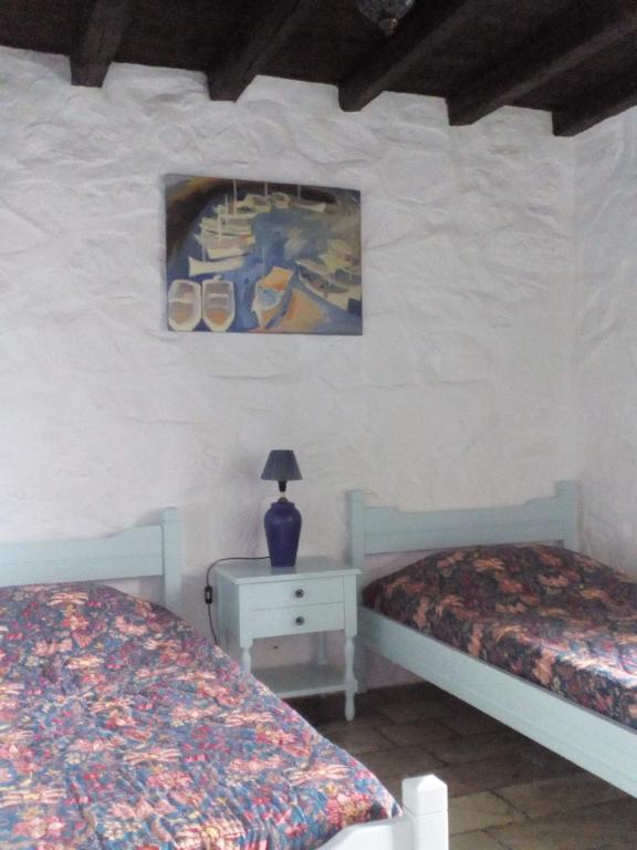 Postel nebo postele na pokoji v ubytování Arbeli house