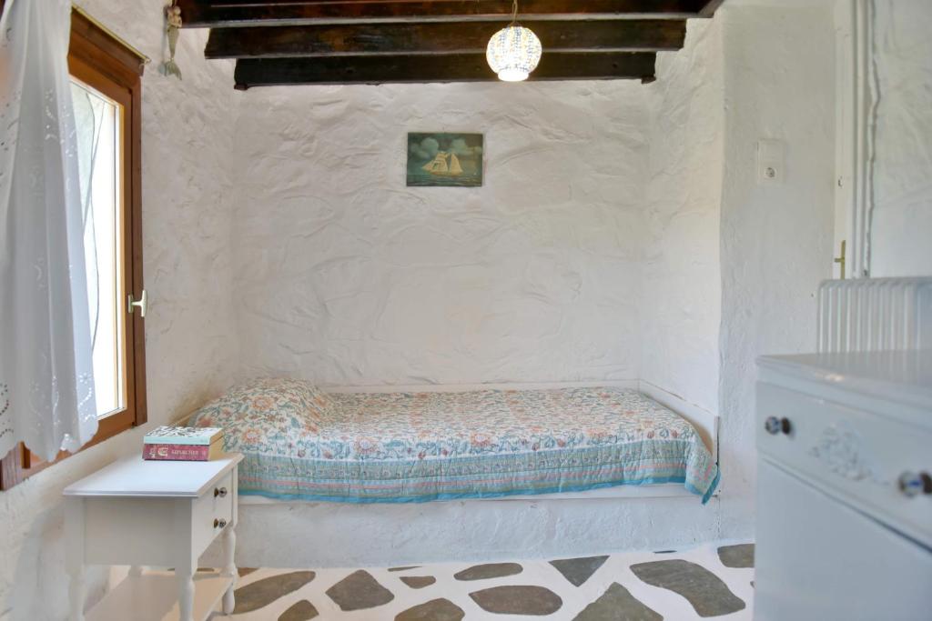Postel nebo postele na pokoji v ubytování Arbeli house