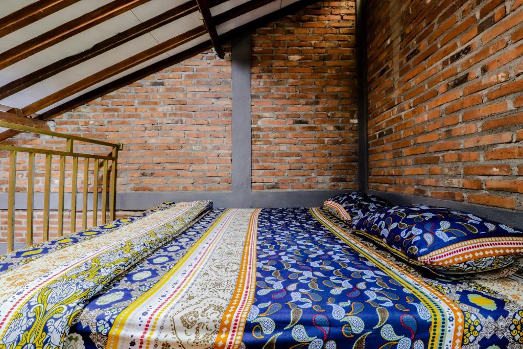 d'Hasinda Homestay - Lit Superposé Dans Une Salle De Dortoir Féminine