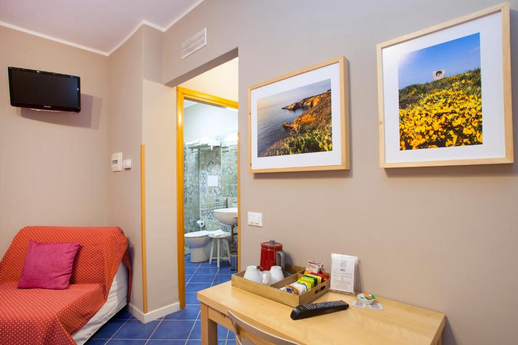 A television and/or entertainment centre at TerraSole Bakery B&B