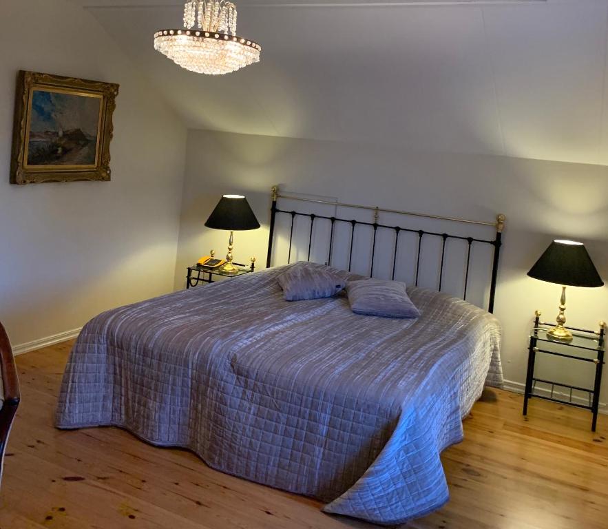 Letto o letti in una camera di Nya Pallas Hotel