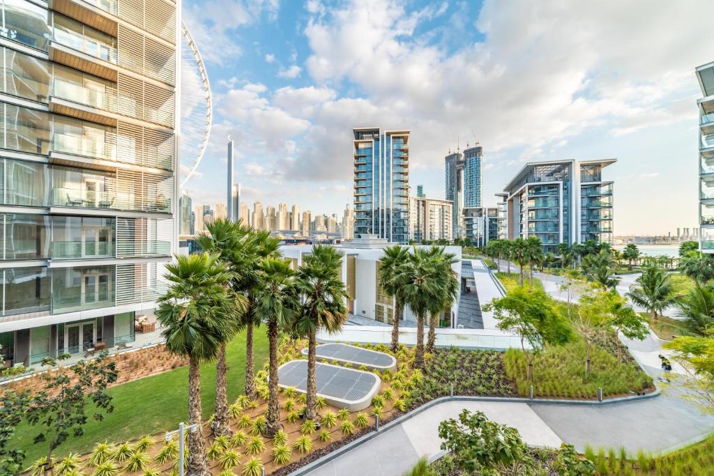 an image of a city skyline with tall buildings at Stunning 3 bedroom apartment in Bluewaters Island in Dubai