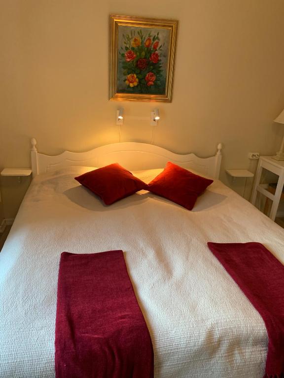 Letto o letti in una camera di Nya Pallas Hotel