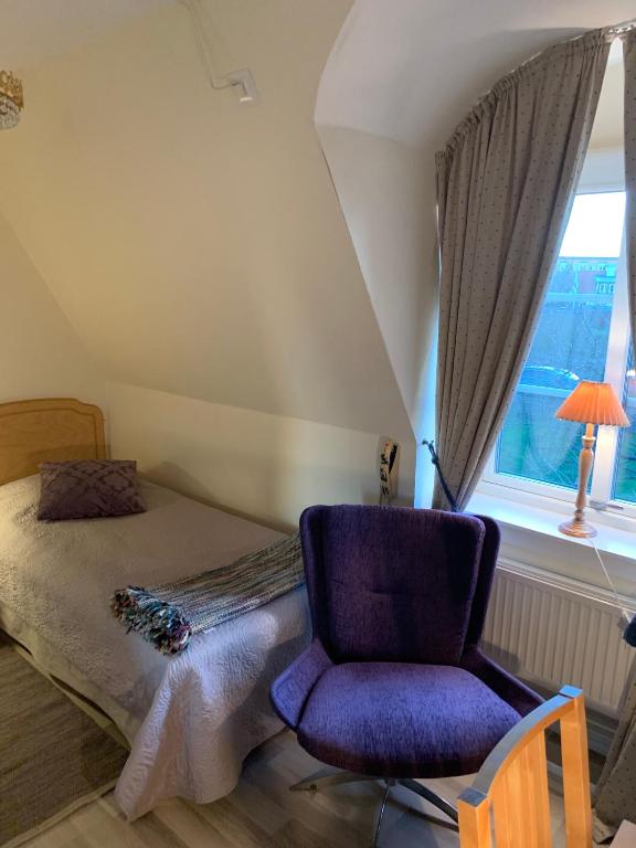 Letto o letti in una camera di Nya Pallas Hotel