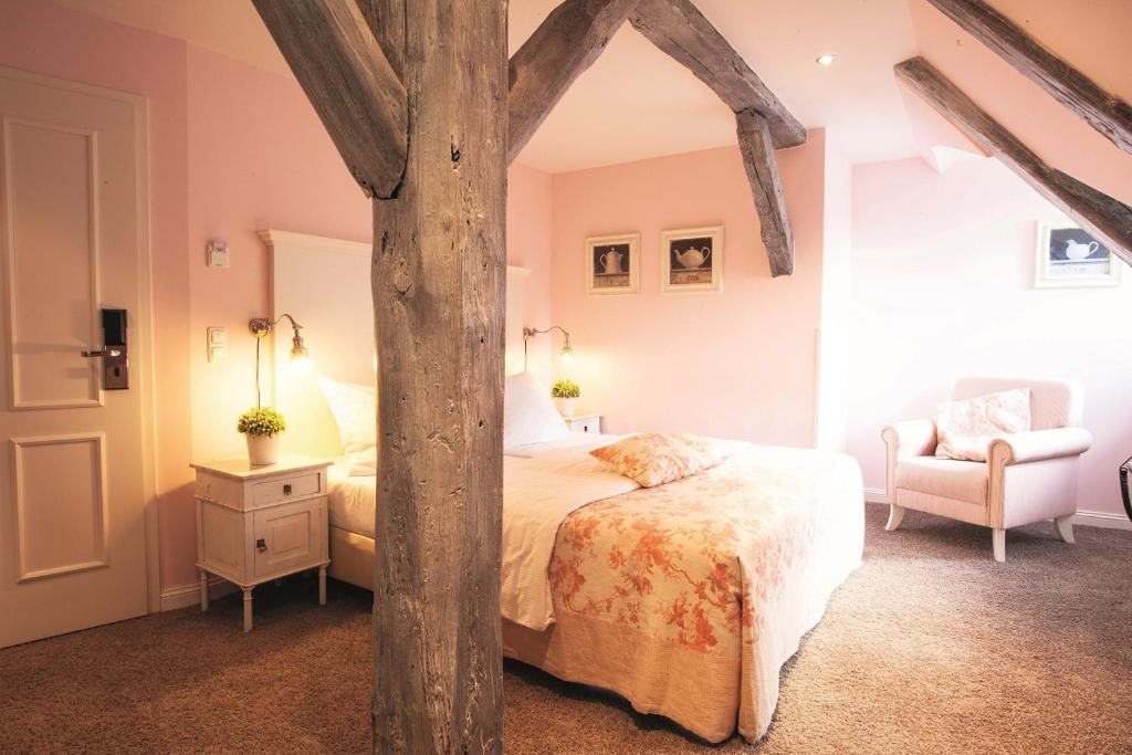 Ein Bett oder Betten in einem Zimmer der Unterkunft Schloss Basthorst