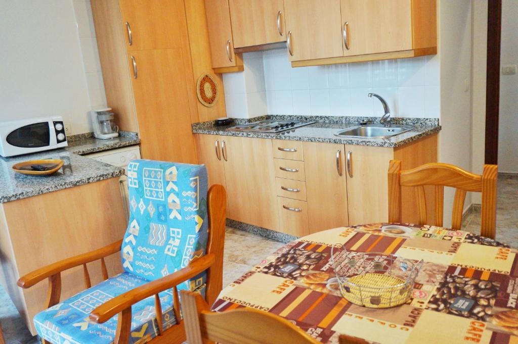 Kuchyň nebo kuchyňský kout v ubytování Vivienda de uso turístico Alma da Costa da Morte