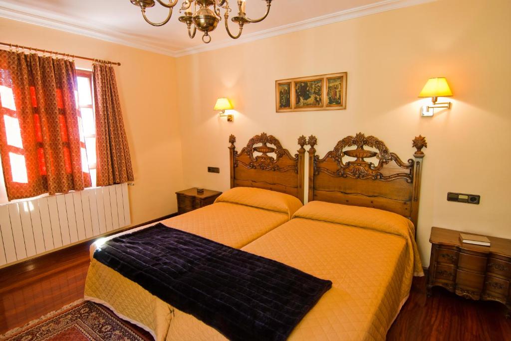 Giường trong phòng chung tại Haras Aritza