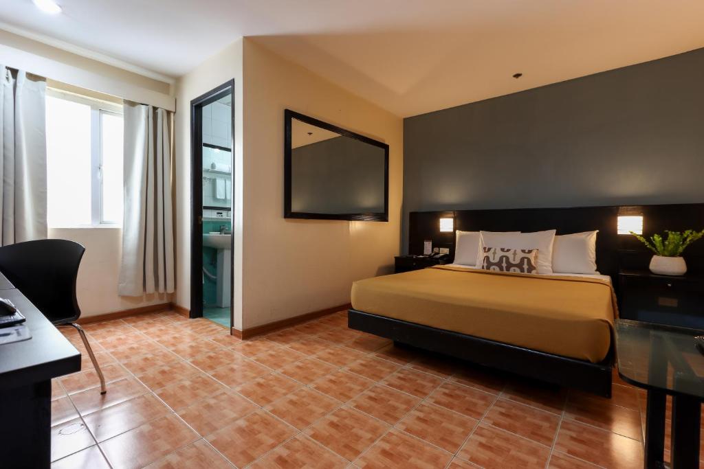 Letto o letti in una camera di Technopark Hotel