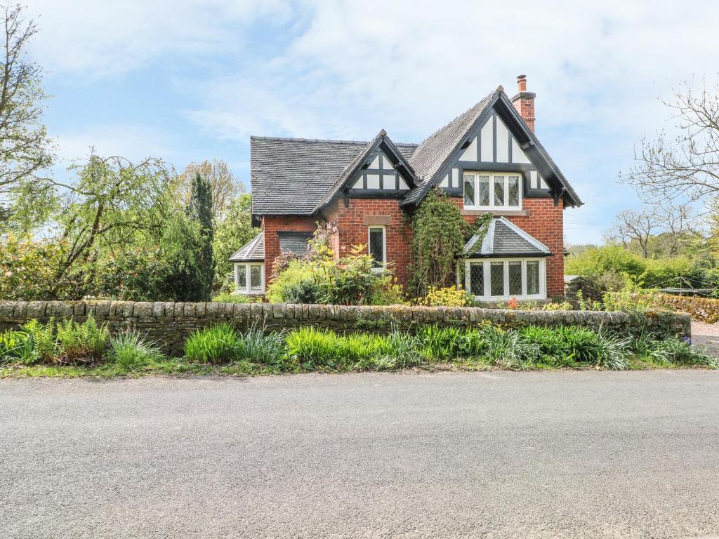 a house on the side of the road at Gun End Cottage in Rushton Spencer