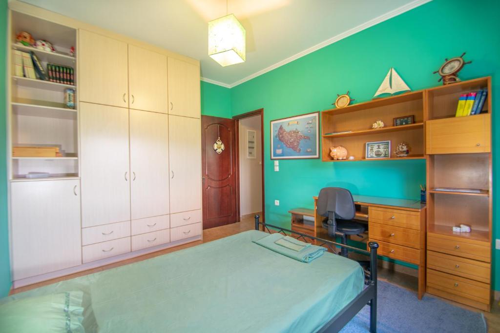 Postel nebo postele na pokoji v ubytování Loukas Farm House