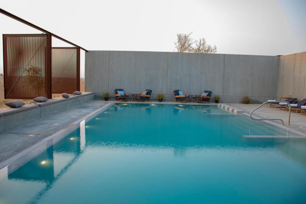 Bazén v ubytování Al Faya Retreat by Sharjah Collection nebo v jeho okolí