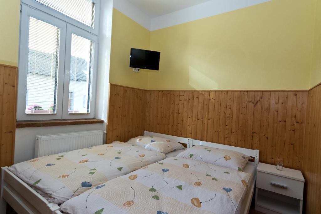 Postel nebo postele na pokoji v ubytování Romance Ubytování