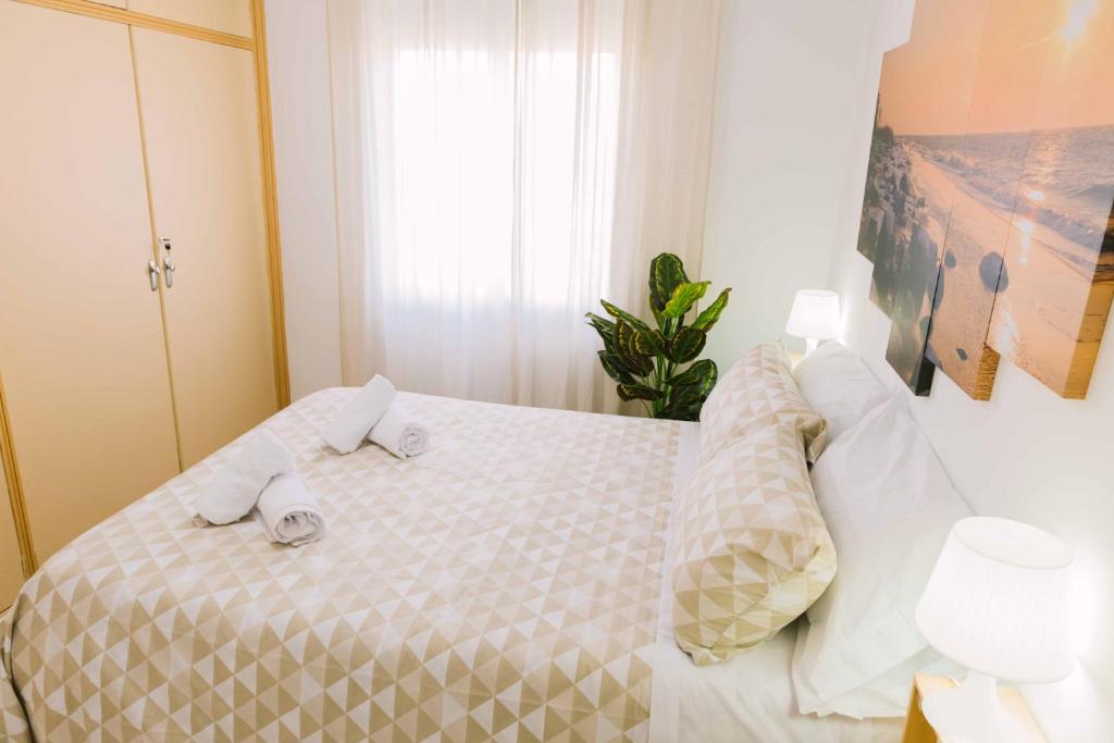 Postel nebo postele na pokoji v ubytování Córdoba Cool Homes, La Ribera