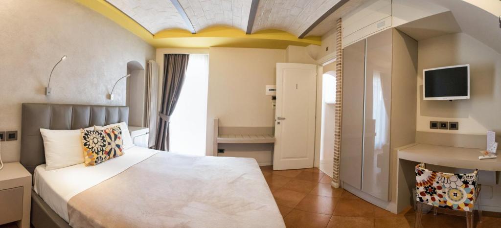 A bed or beds in a room at Casa Turrisi