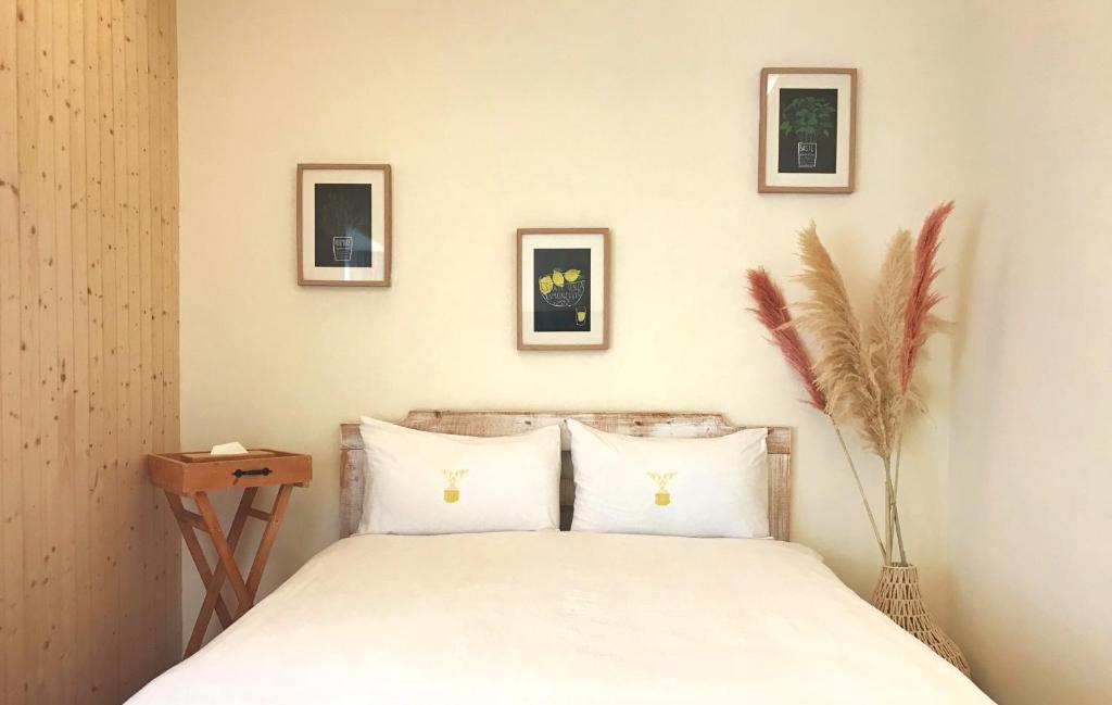 Postel nebo postele na pokoji v ubytování 墾丁寵物友善 鐵宿 Tetsu B&B