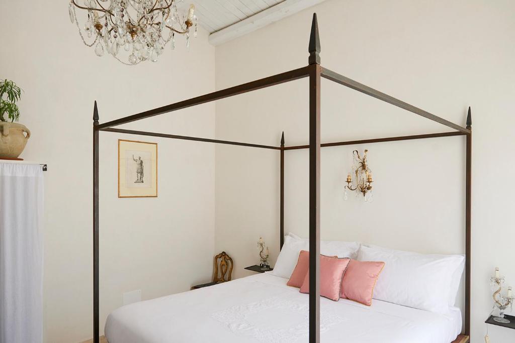Postel nebo postele na pokoji v ubytování Casa Scianna Noto