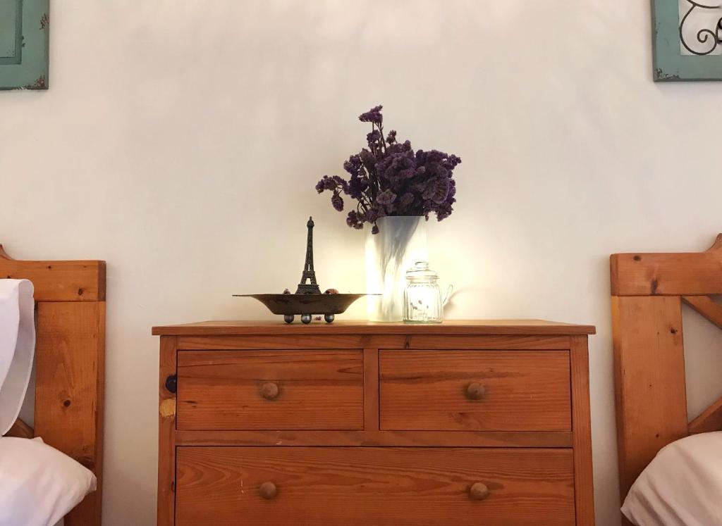 Postel nebo postele na pokoji v ubytování 墾丁寵物友善 鐵宿 Tetsu B&B