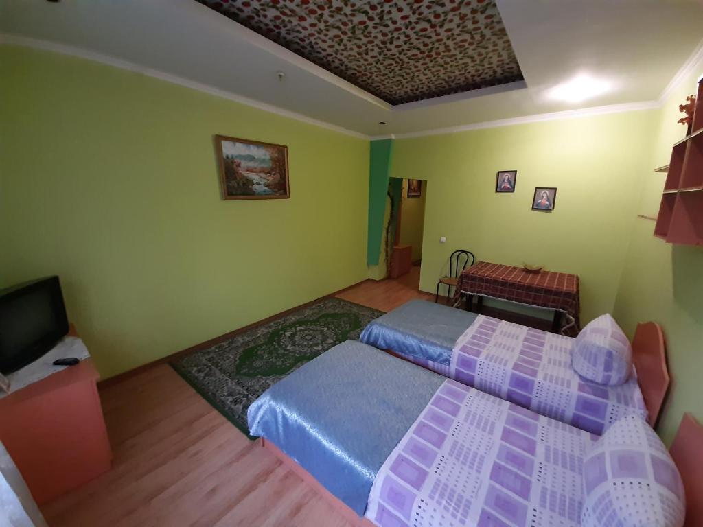 Postel nebo postele na pokoji v ubytování Лагуна
