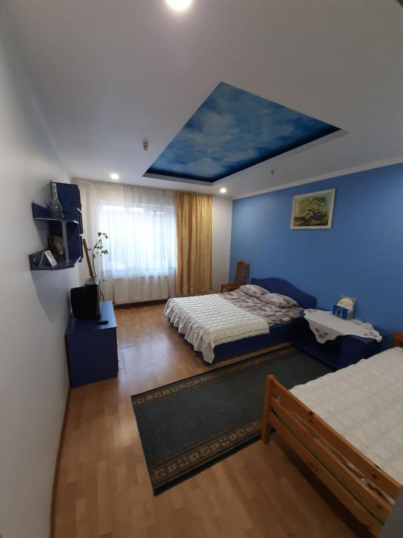 Postel nebo postele na pokoji v ubytování Лагуна