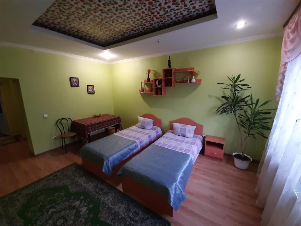 Postel nebo postele na pokoji v ubytování Лагуна