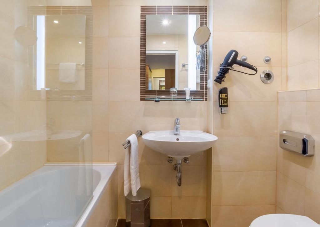 Koupelna v ubytování Hotel Astor