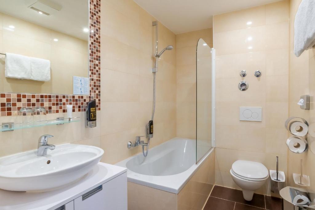 Koupelna v ubytování Hotel Astor