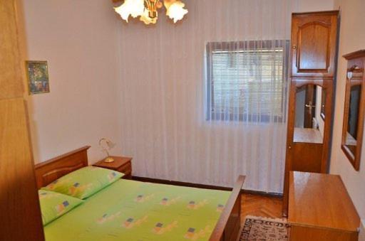 Postel nebo postele na pokoji v ubytování Apartment Knez