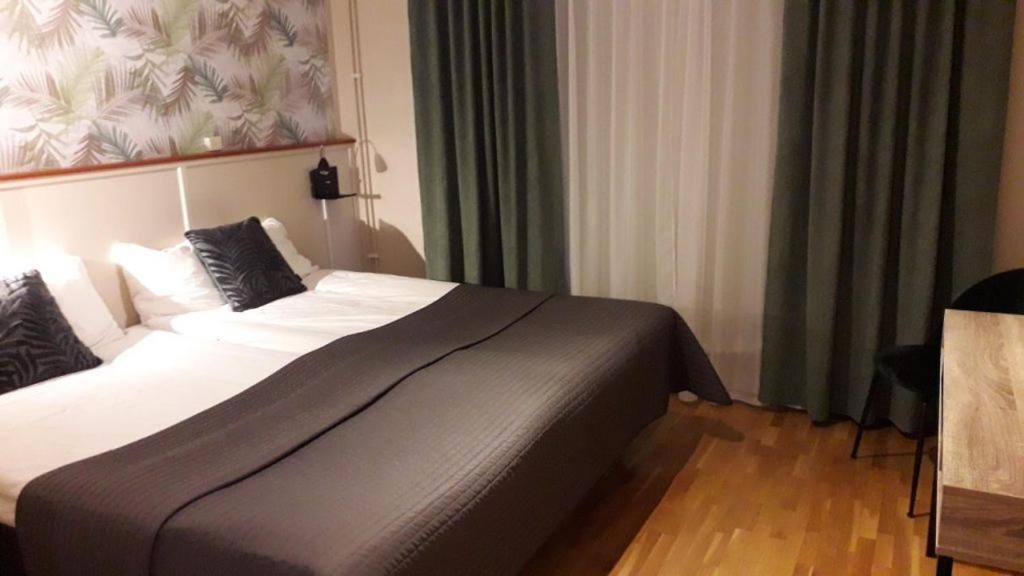 Postel nebo postele na pokoji v ubytování Dinners
