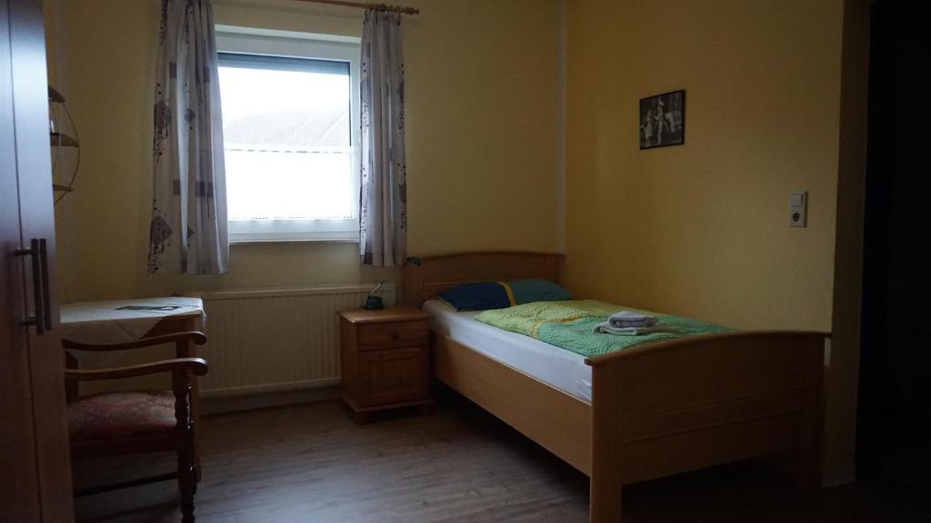 Postel nebo postele na pokoji v ubytování Logia Hotel garni