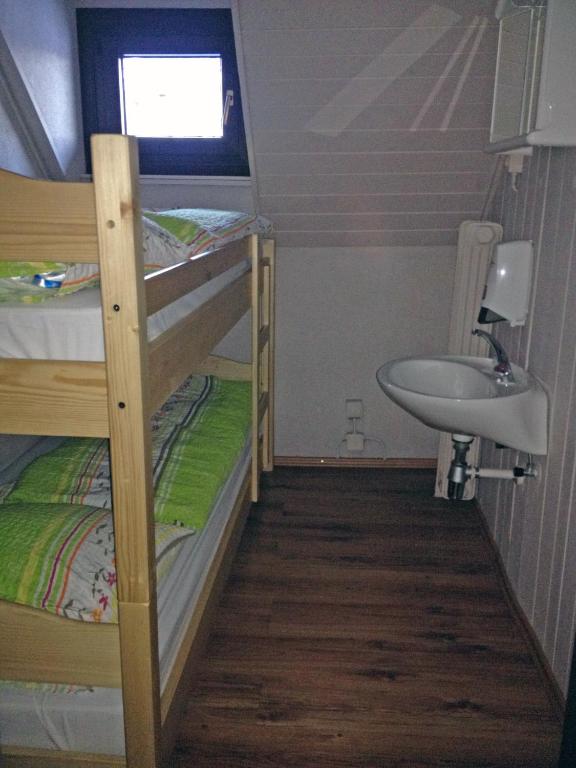 Postel nebo postele na pokoji v ubytování Chalet Hostel Murka