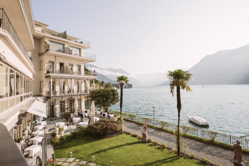 a hotel with a view of the water at Hotel Villa Flori in Como