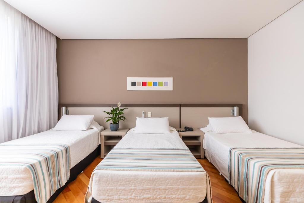 Postel nebo postele na pokoji v ubytování Viale Cataratas Hotel & Eventos