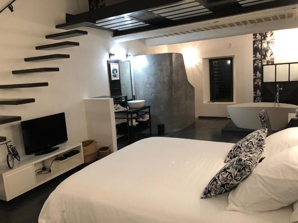 Postel nebo postele na pokoji v ubytování B&B dans Mas en pierres