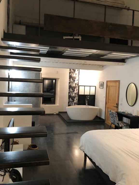 TV a/nebo společenská místnost v ubytování B&B dans Mas en pierres