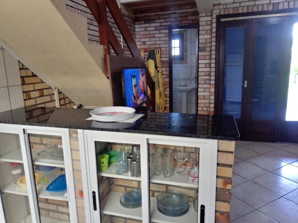 Kuchyň nebo kuchyňský kout v ubytování Pousada Don Fernandes