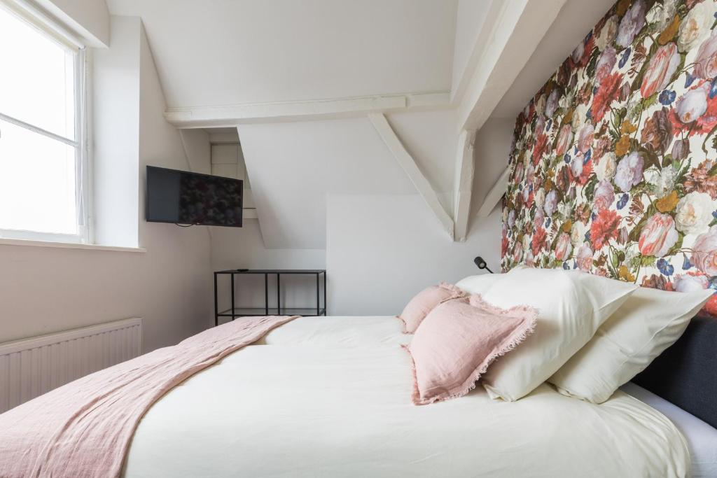 Postel nebo postele na pokoji v ubytování Logement de Spaerpot