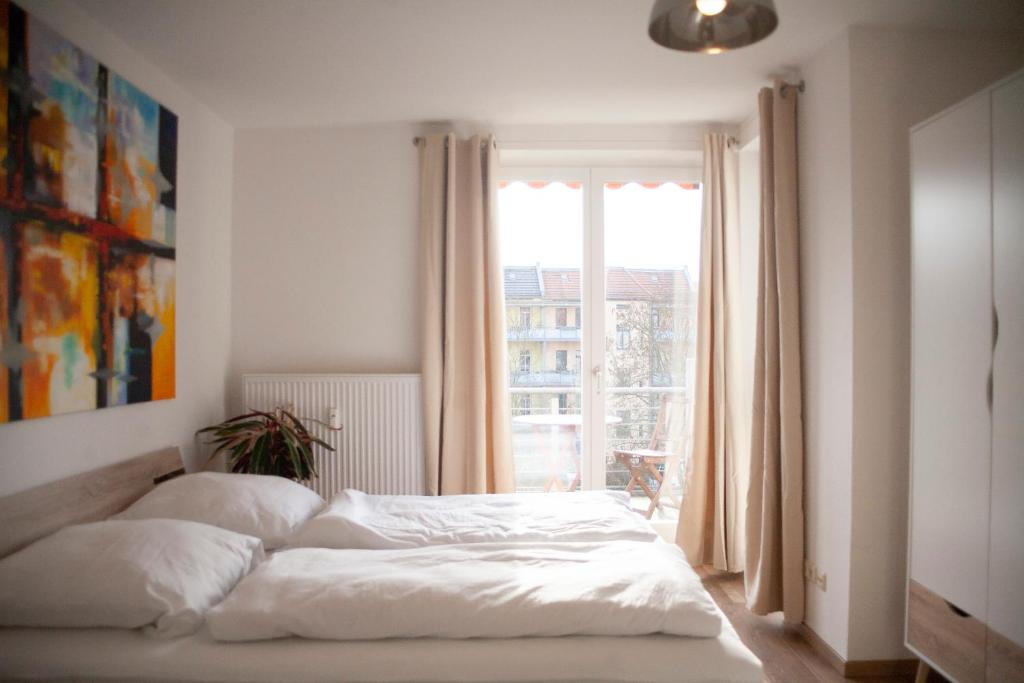 Una cama o camas en una habitación de Apartment von Schivelbusch