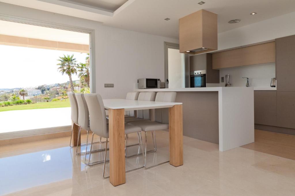 Kuchyň nebo kuchyňský kout v ubytování Apartment HORIZON