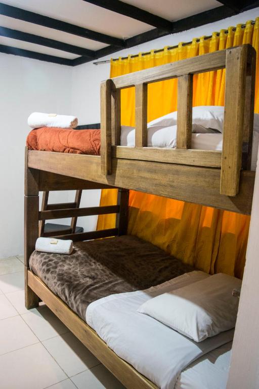 Postel nebo postele na pokoji v ubytování Ulucaho Hostel
