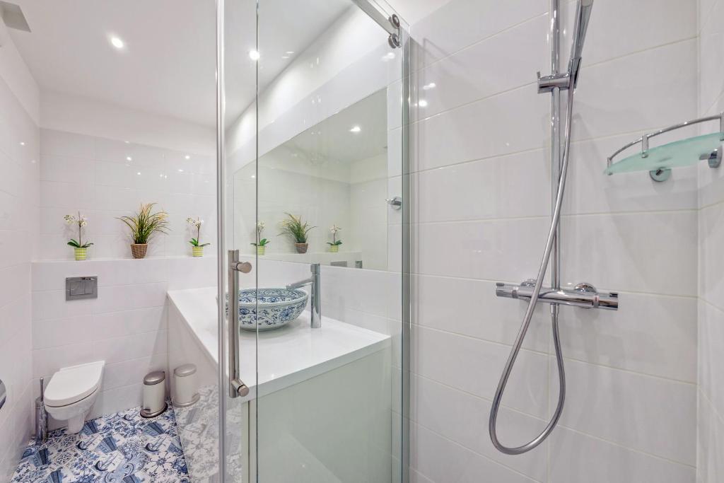 Kúpeľňa v ubytovaní Apartamenty Sun & Snow Cztery Oceany