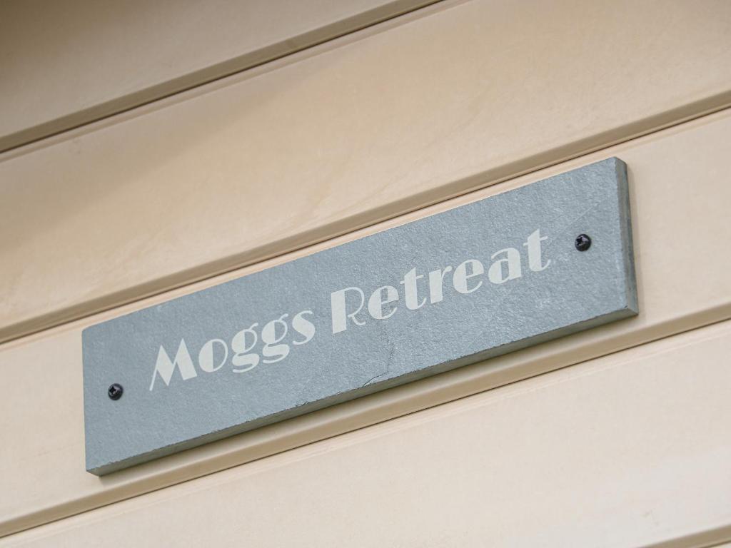 a sign that says moose retrieval on a wall at Moggs Retreat in Skegness